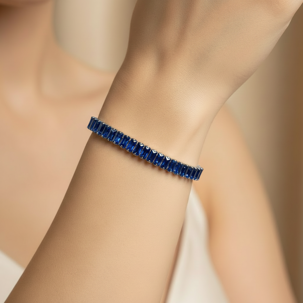 Girl wearing blue sapphire bracelet - square format
